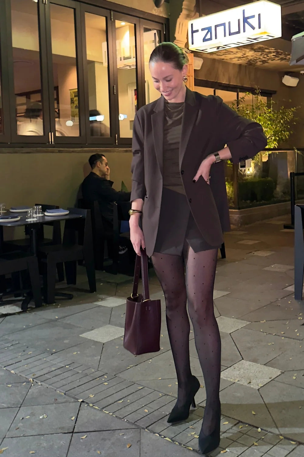 Full-length editorial look featuring INSTOCK Eclipse patterned tights